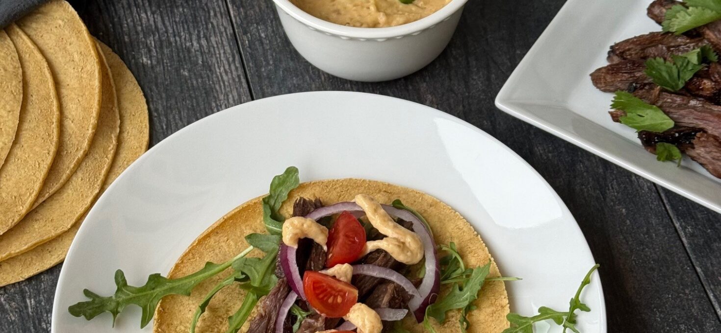 STEAK TACOS with CARAMELIZED ONION QUESO