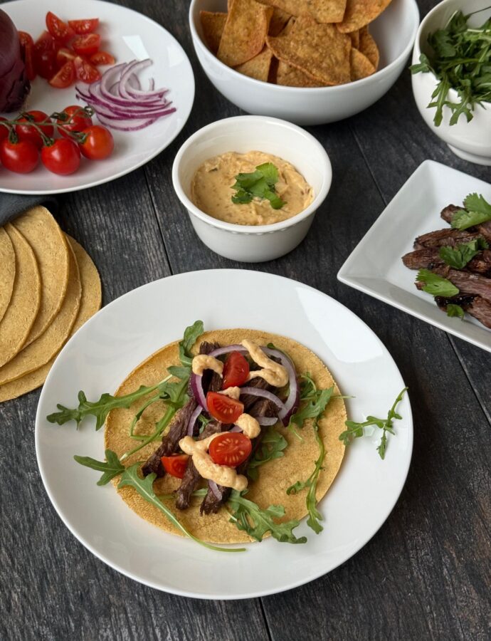 STEAK TACOS with CARAMELIZED ONION QUESO