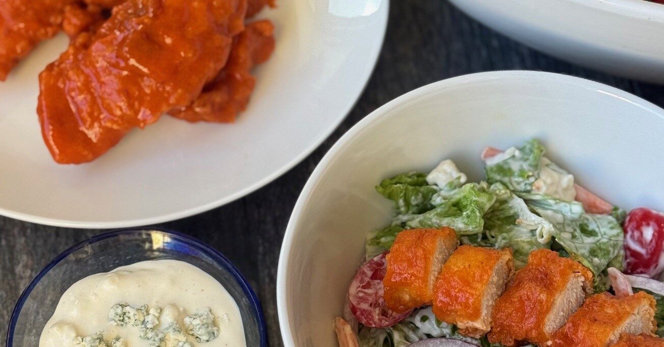 BUFFALO CHICKEN TENDERS with BLUE CHEESE SALAD
